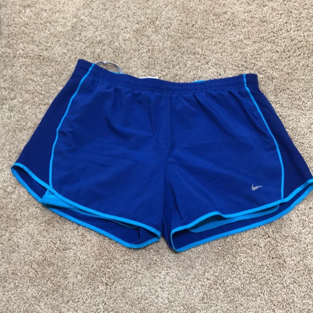 NIKE Dri fit Size M blue athletic shorts